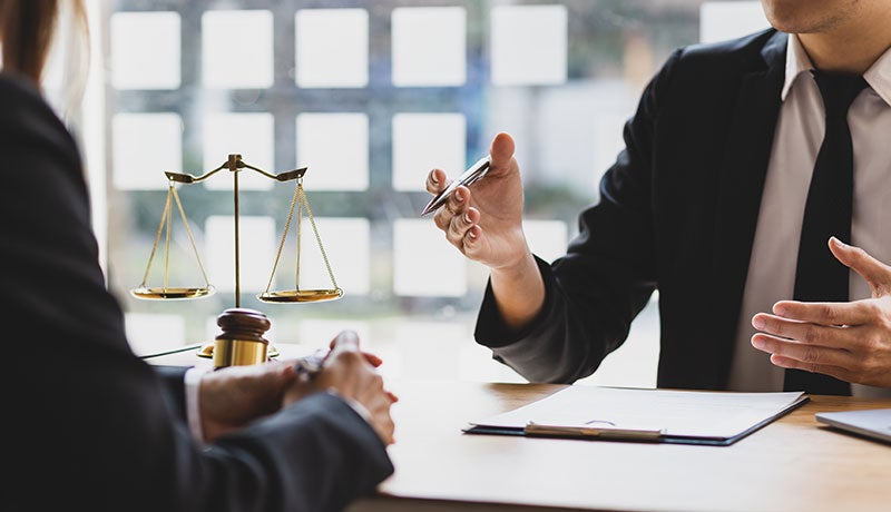 Divorce attorney helping clients
